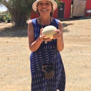Desnise holidng an ostrich egg