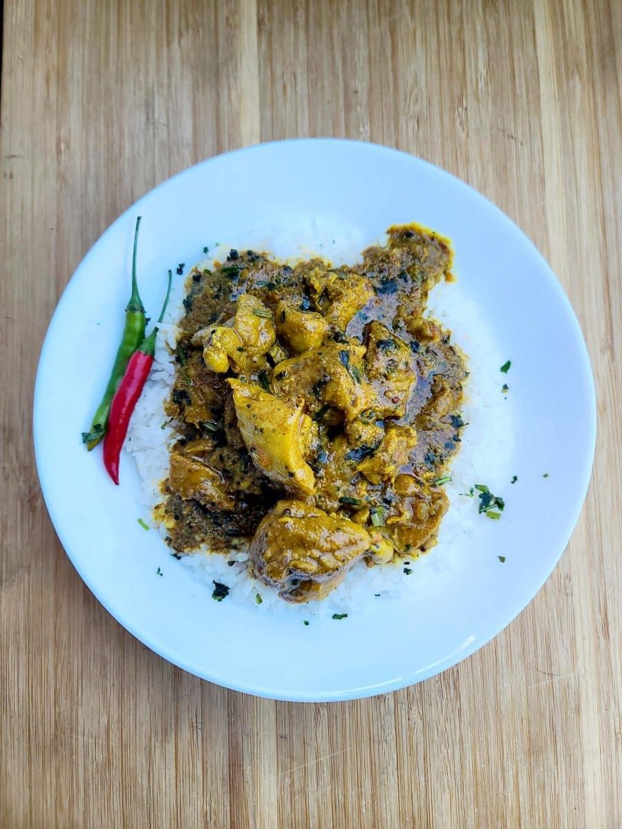 Biryani Dish with spiced chicken over rice