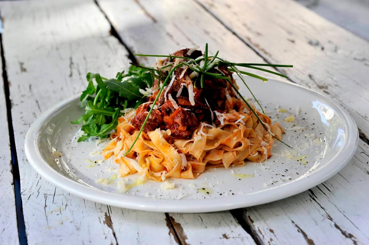 Delicious beef ragout served on a white plate.